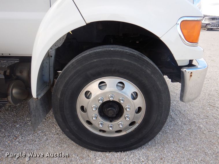 image for item DP0415 2015 Ford F750 Super Duty XLT  SuperCab flatbed truck