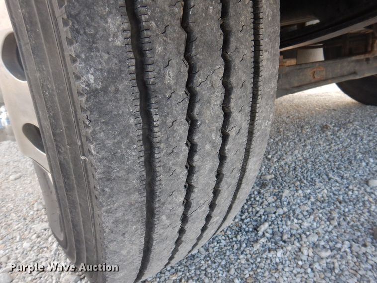 image for item DP0415 2015 Ford F750 Super Duty XLT  SuperCab flatbed truck