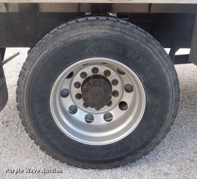 image for item DP0415 2015 Ford F750 Super Duty XLT  SuperCab flatbed truck