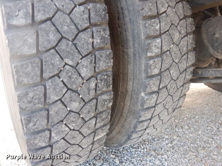 image for item DP0415 2015 Ford F750 Super Duty XLT  SuperCab flatbed truck