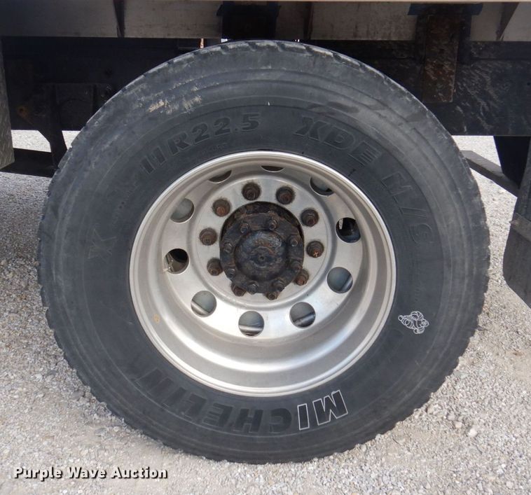 image for item DP0415 2015 Ford F750 Super Duty XLT  SuperCab flatbed truck