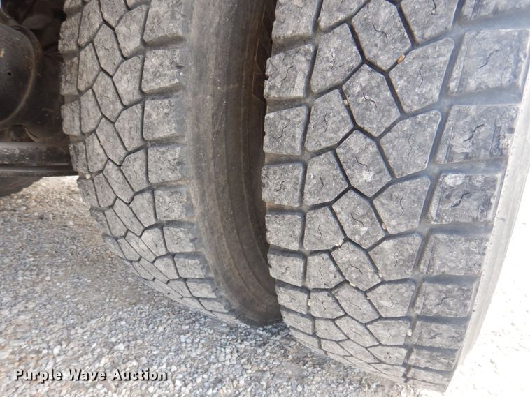 image for item DP0415 2015 Ford F750 Super Duty XLT  SuperCab flatbed truck