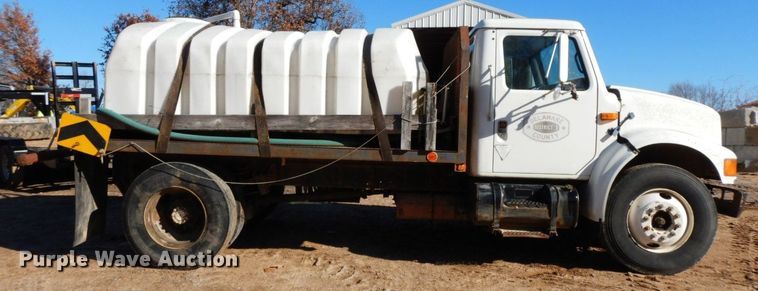 image for item HG9309 1990 International 4700  flatbed truck