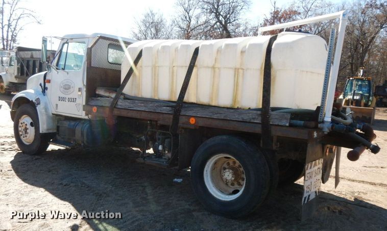 image for item HG9309 1990 International 4700  flatbed truck