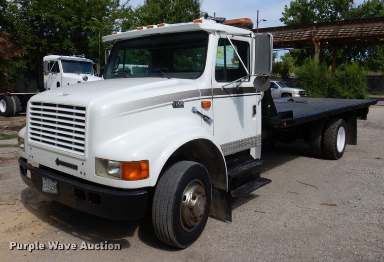 image for item KF9611 1998 International 4700  rollback truck