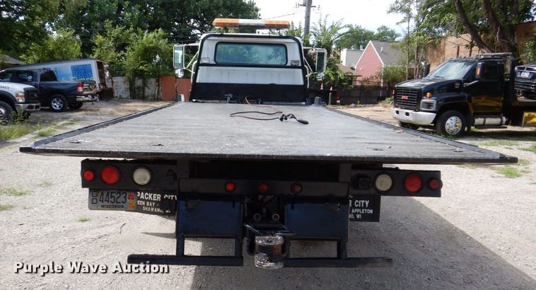 image for item KF9611 1998 International 4700  rollback truck