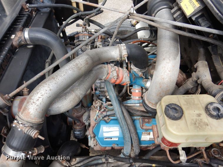 image for item KF9611 1998 International 4700  rollback truck