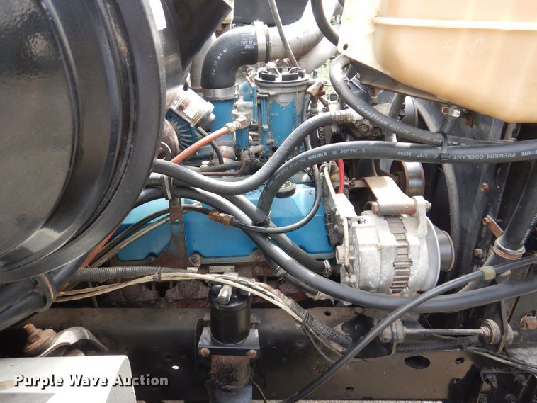 image for item KF9611 1998 International 4700  rollback truck