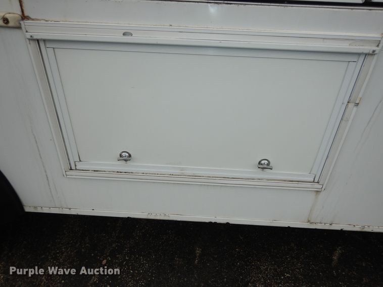 image for item DI6997 2013 Ford E450 Super Duty  shuttle bus