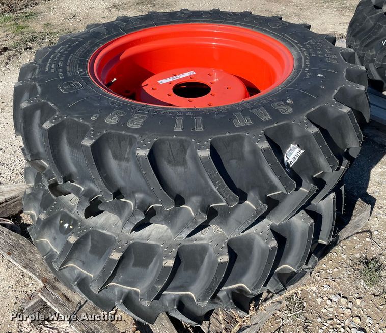 image for item MI9662 (2) 12.4-24 tires and wheels