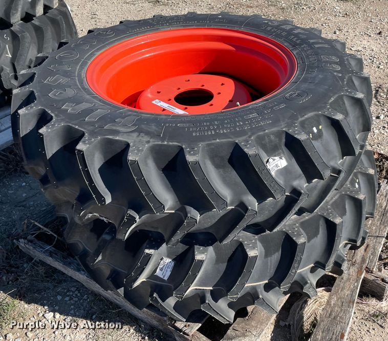 image for item MI9662 (2) 12.4-24 tires and wheels