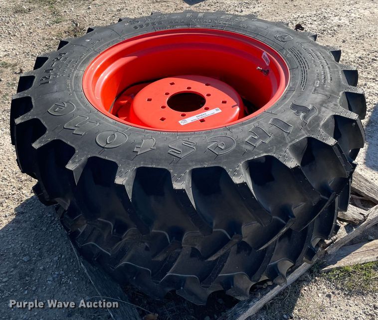 image for item MI9662 (2) 12.4-24 tires and wheels