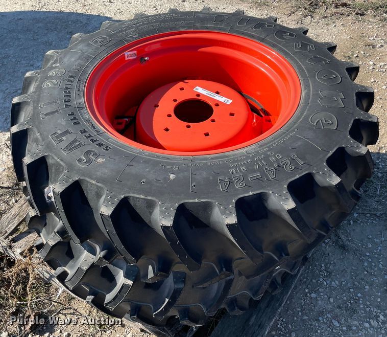 image for item MI9662 (2) 12.4-24 tires and wheels