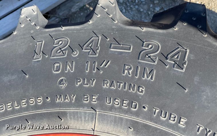 image for item MI9662 (2) 12.4-24 tires and wheels