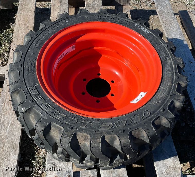 image for item MI9672 23x8.50-14 tire and wheel