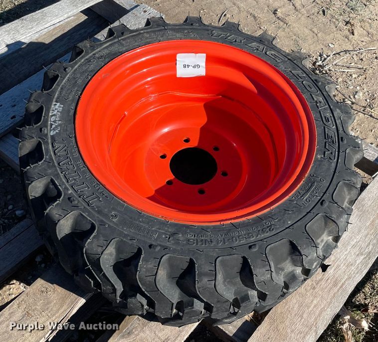 image for item MI9672 23x8.50-14 tire and wheel