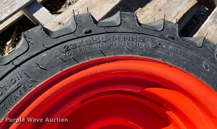image for item MI9672 23x8.50-14 tire and wheel