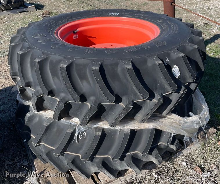 image for item MI9687 (2) 14.9-24 tires and wheels