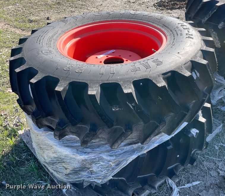 image for item MI9687 (2) 14.9-24 tires and wheels