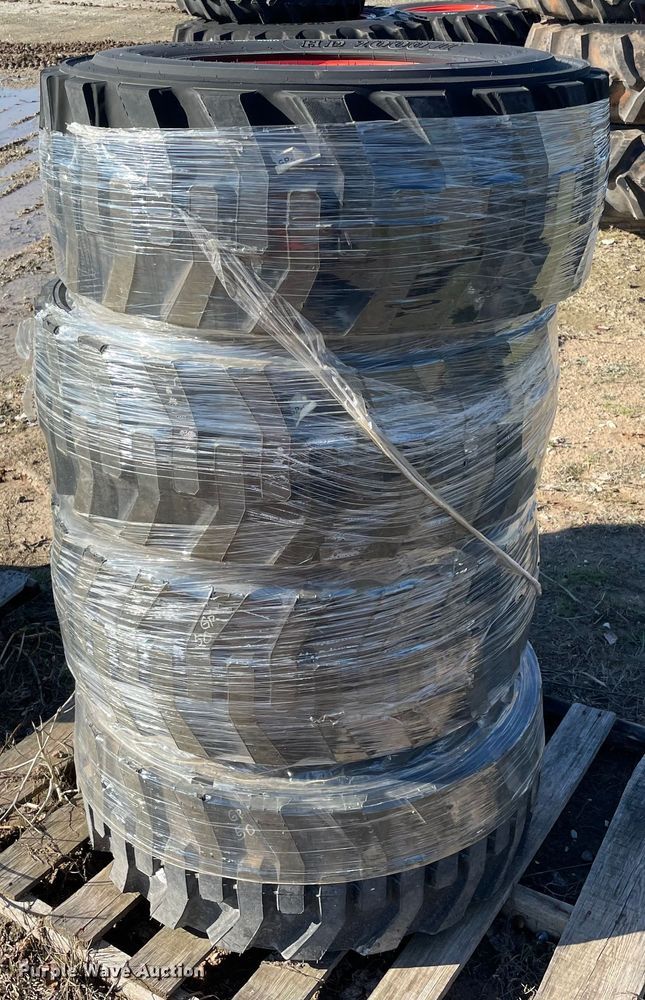 image for item MI9697 (4) 12-16.5 tires and wheels