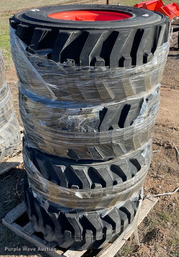 image for item MI9698 (4) 12-16.5 tires and wheels