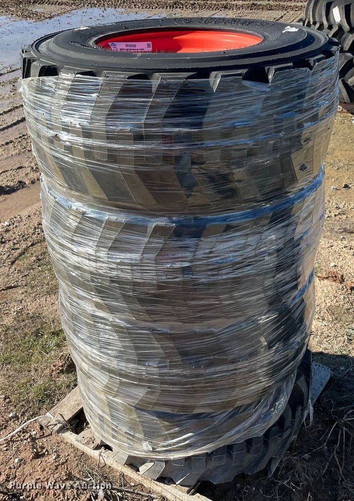 image for item MI9698 (4) 12-16.5 tires and wheels