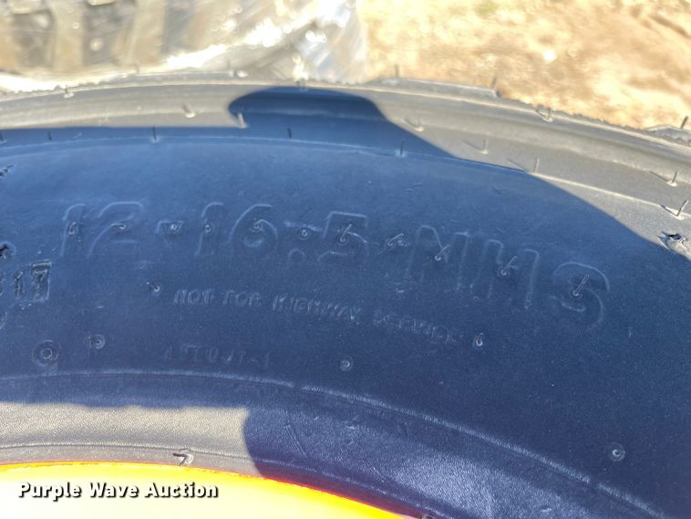 image for item MI9698 (4) 12-16.5 tires and wheels