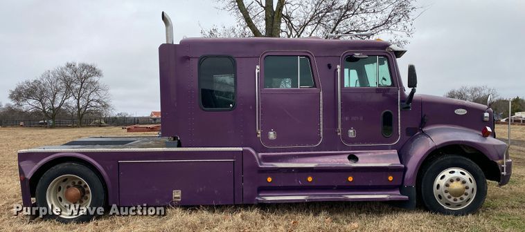 image for item DN8108 1999 Peterbilt 330 flatbed truck