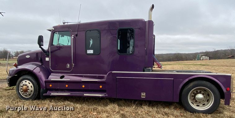 image for item DN8108 1999 Peterbilt 330 flatbed truck