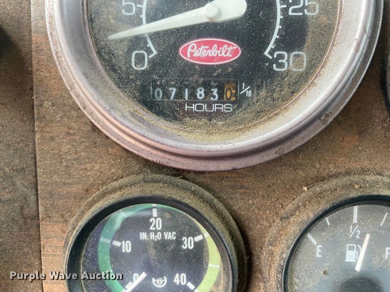 image for item DN8108 1999 Peterbilt 330 flatbed truck