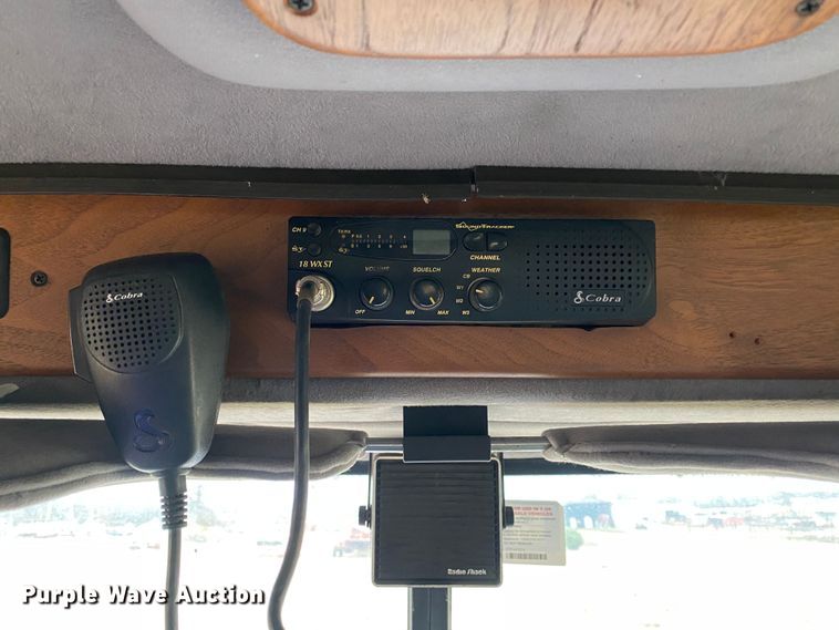 image for item DN8108 1999 Peterbilt 330 flatbed truck