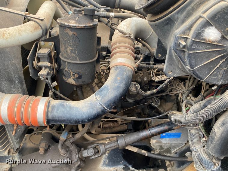 image for item DN8108 1999 Peterbilt 330 flatbed truck