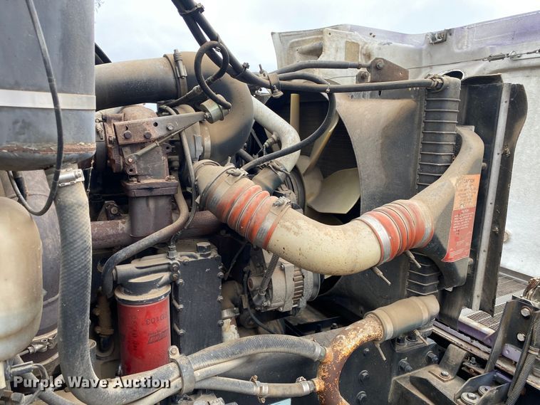 image for item DN8108 1999 Peterbilt 330 flatbed truck