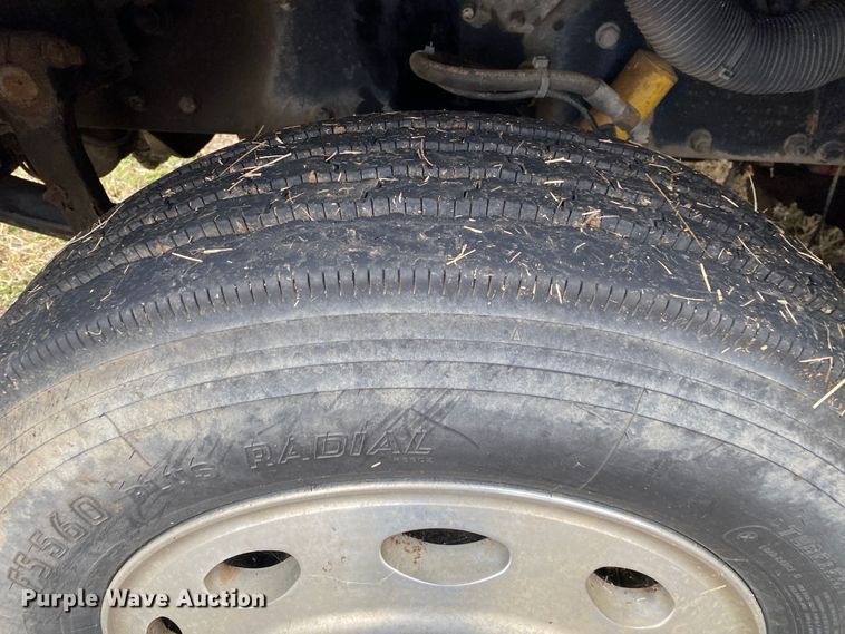 image for item DN8108 1999 Peterbilt 330 flatbed truck