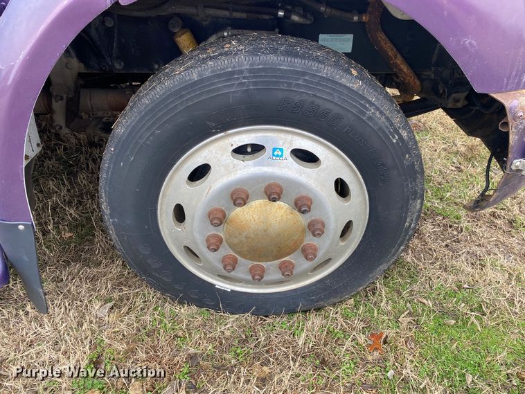 image for item DN8108 1999 Peterbilt 330 flatbed truck