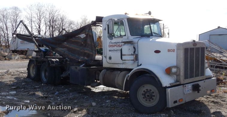 image for item DS1531 1993 Peterbilt 357  roll-off container truck