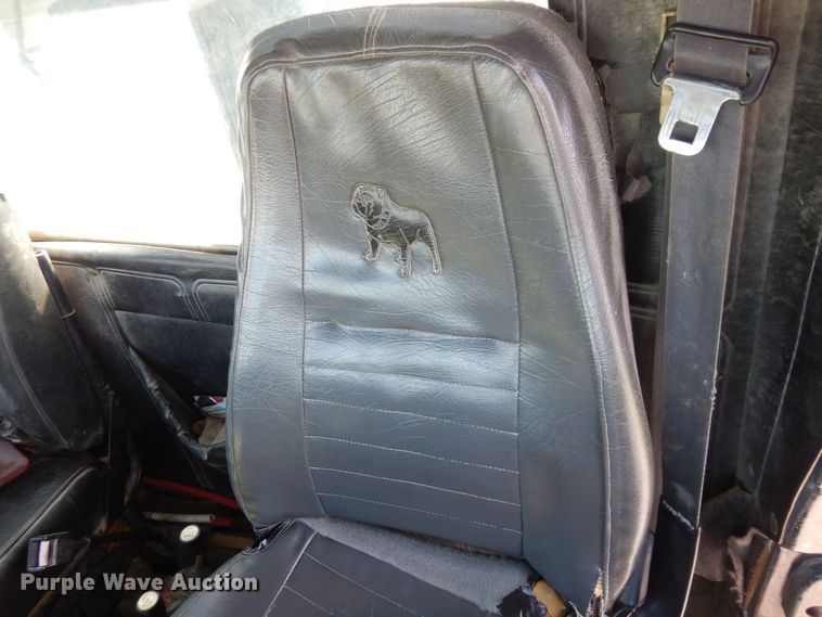 image for item DS1532 1991 Mack DM690S  roll-off container truck