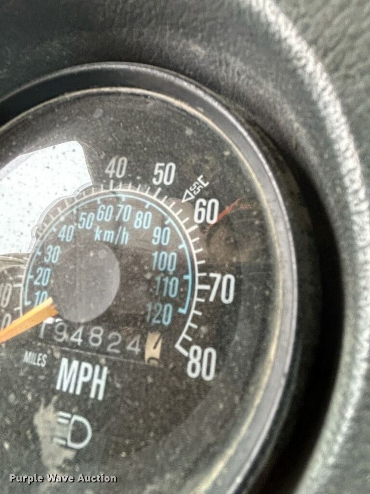 image for item DS1532 1991 Mack DM690S  roll-off container truck