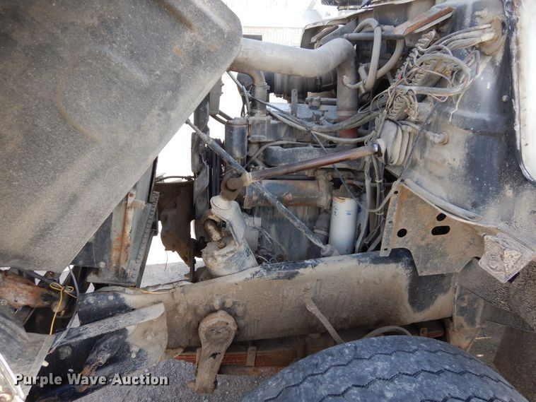 image for item DS1532 1991 Mack DM690S  roll-off container truck