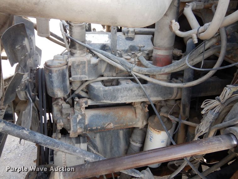 image for item DS1532 1991 Mack DM690S  roll-off container truck