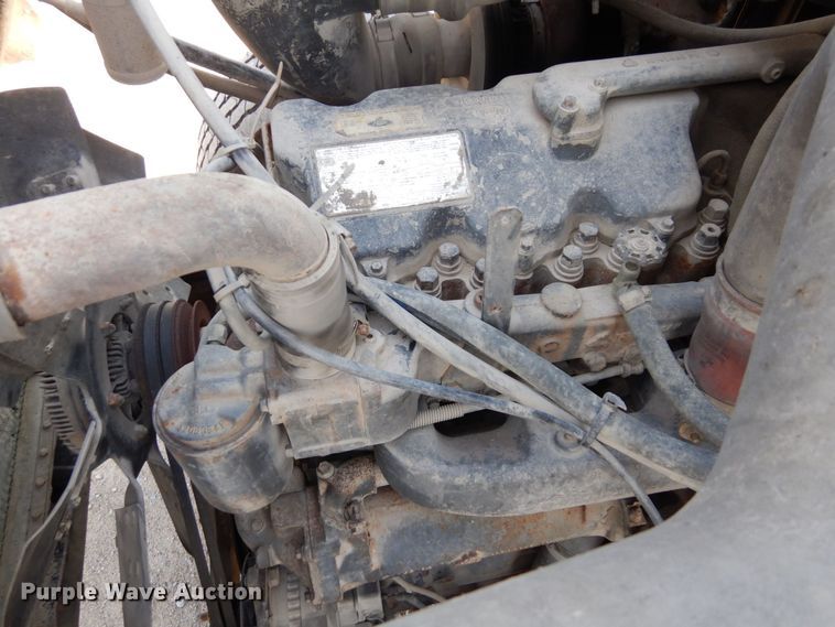 image for item DS1532 1991 Mack DM690S  roll-off container truck