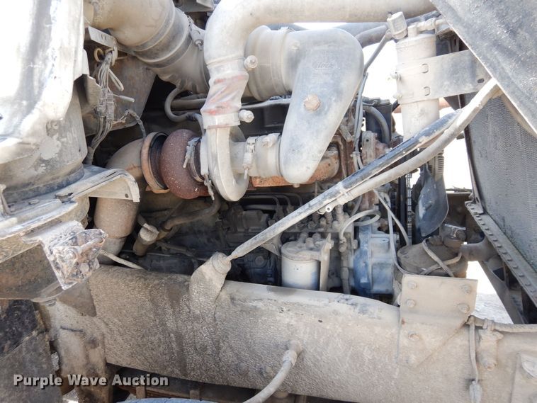 image for item DS1532 1991 Mack DM690S  roll-off container truck