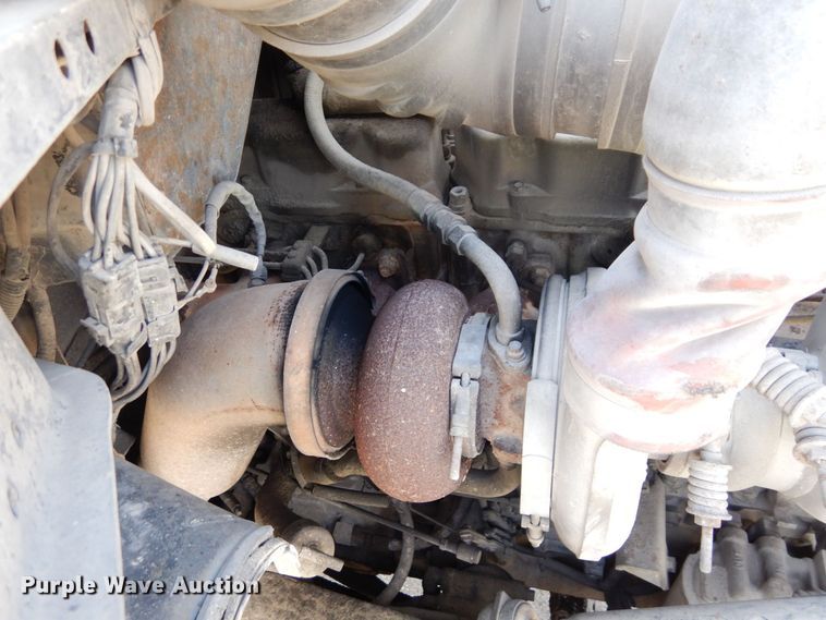 image for item DS1532 1991 Mack DM690S  roll-off container truck