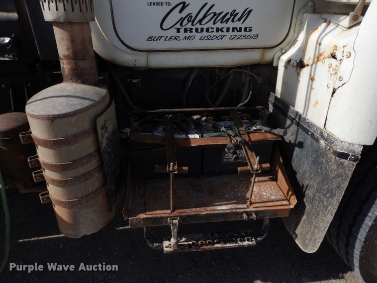 image for item DS1532 1991 Mack DM690S  roll-off container truck