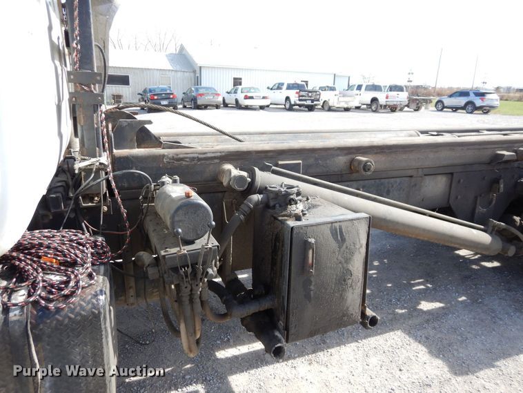 image for item DS1532 1991 Mack DM690S  roll-off container truck