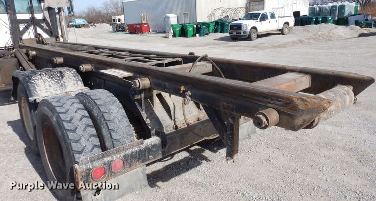 image for item DS1532 1991 Mack DM690S  roll-off container truck