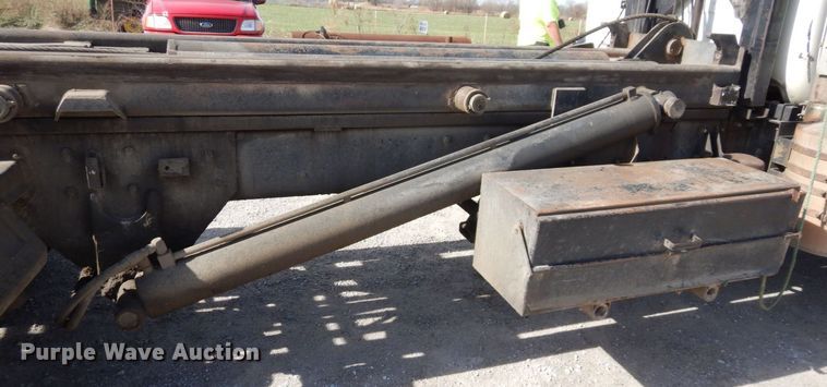 image for item DS1532 1991 Mack DM690S  roll-off container truck