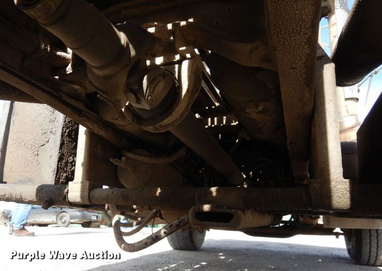 image for item DS1532 1991 Mack DM690S  roll-off container truck