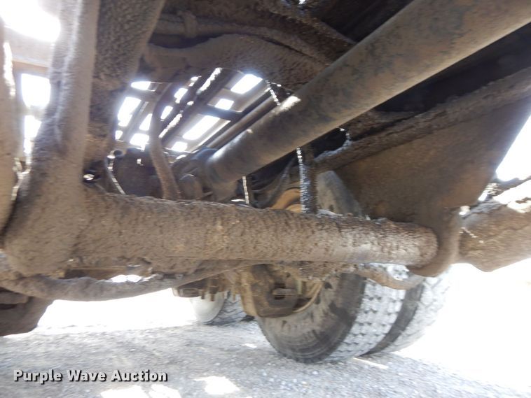 image for item DS1532 1991 Mack DM690S  roll-off container truck