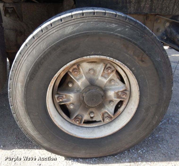 image for item DS1532 1991 Mack DM690S  roll-off container truck